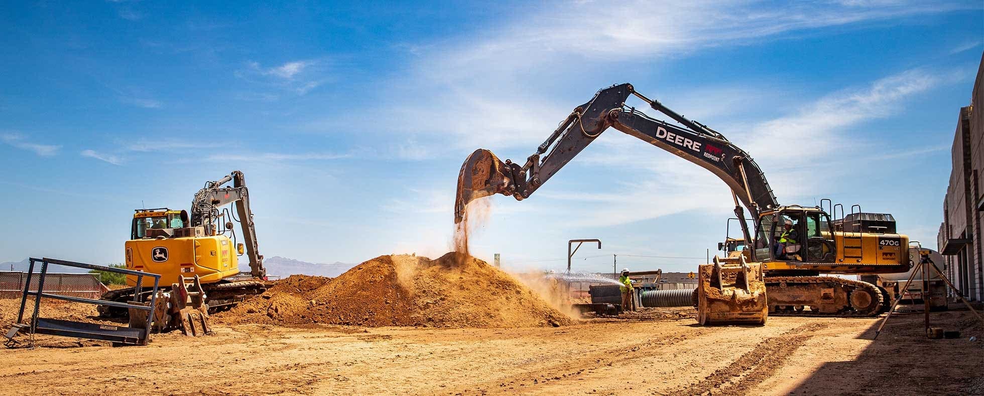 Equipment lined up across the dealership yard